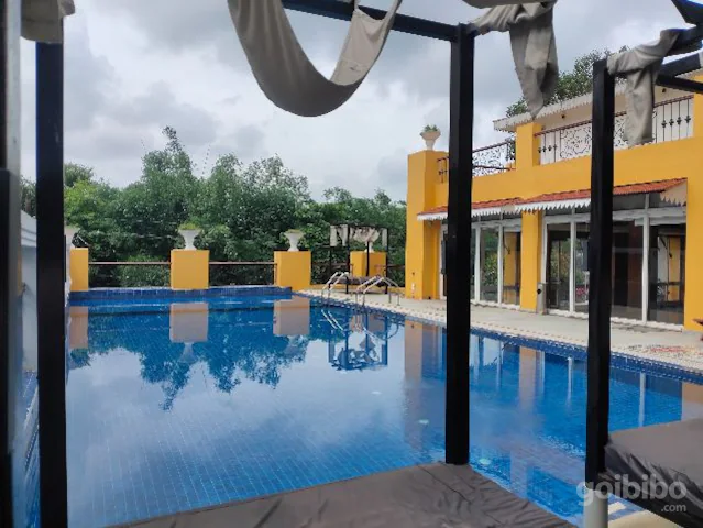 Simple, tidy rooms at Aranya Resort, Santiniketan