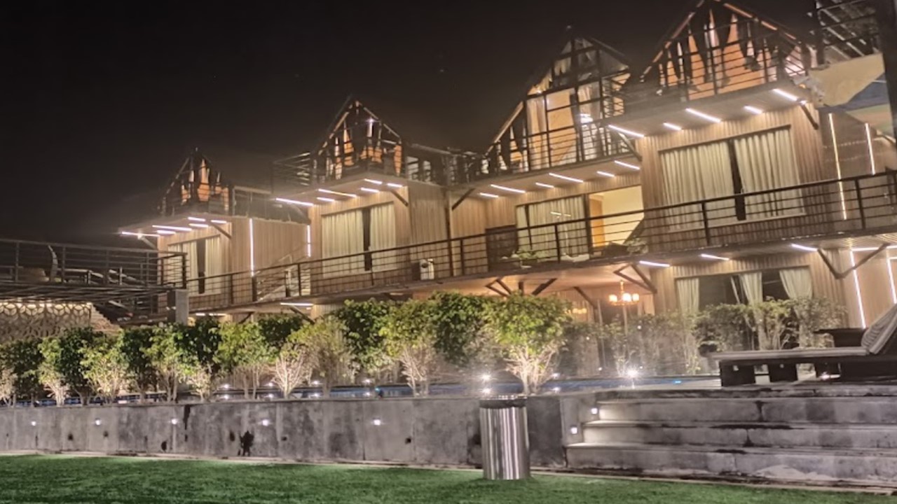 Pathways and evening lighting across the property